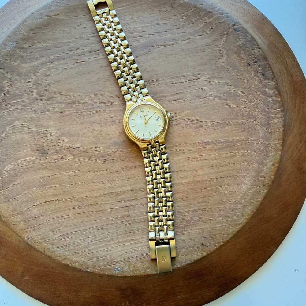 Bulova Vintage Gold Tone Ladies Watch 97P28 Diamond Accent Date Window